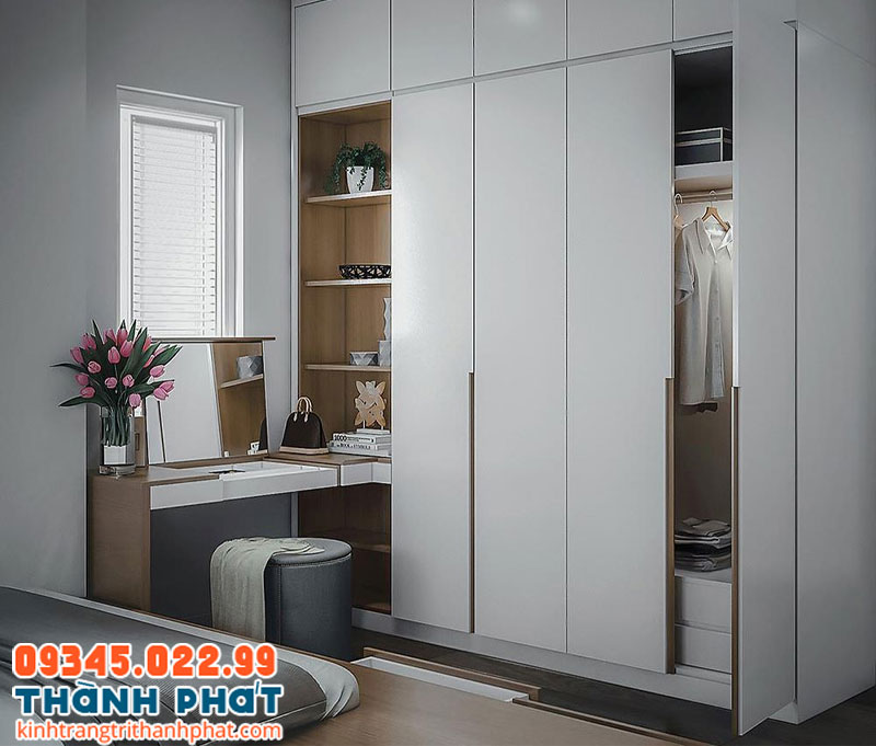 Đặt bàn trang điểm cạnh tủ quần áo hoặc sát tường